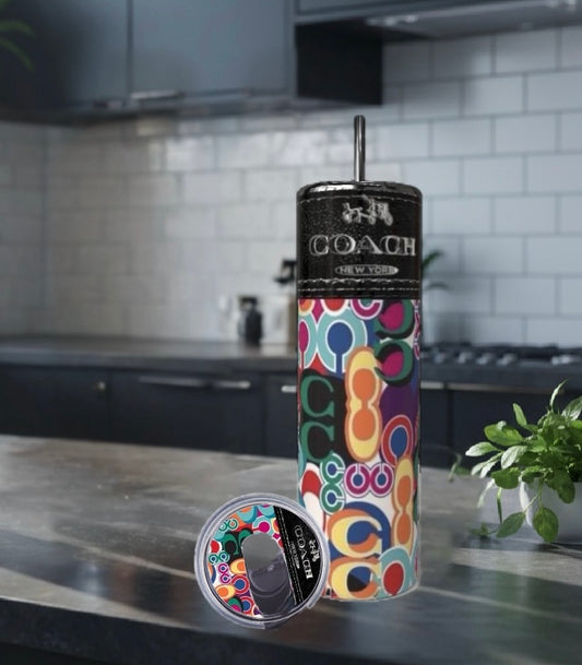 Colorful tumbler on a kitchen counter with a blurred background