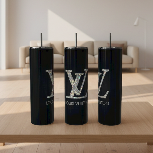 Three tumblers on a wooden table in a modern living room.