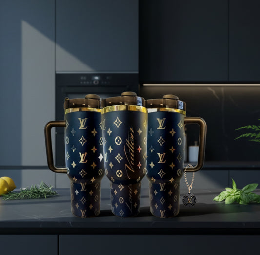 Three blue mugs with gold patterns on a dark surface