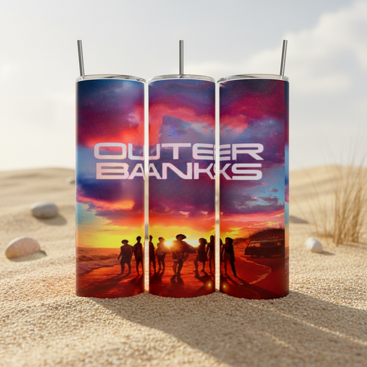 e 20oz stainless steel tumblers with a sunset beach design featuring silhouettes of people and a vehicle. "Outer Banks" is displayed in bold white letters, making these OBX - Sunset tumblers stylish and eco-friendly for conscious consumers.