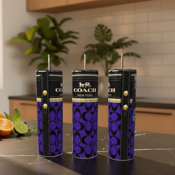 Three-patterned tumblers on a kitchen counter with plants in the background.