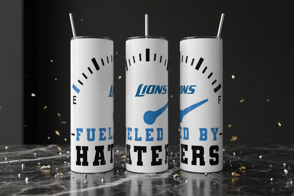 Three white tumblers with blue and black text and graphics on a reflective surface.
