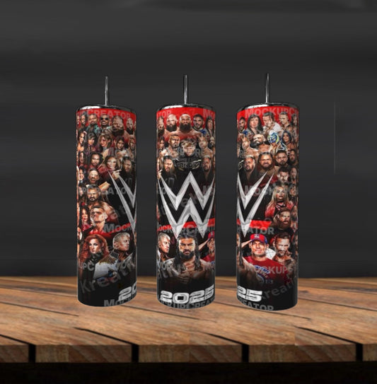 Three cylindrical tumblers with wrestling-themed designs on a wooden surface.